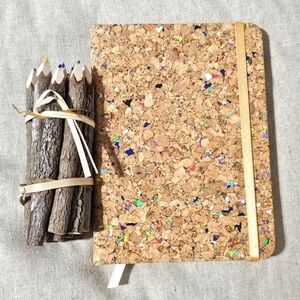 Set of color pencils and cork journal